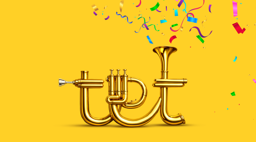 Zeltaina trompetes formas ilustrācija, kas veido vārdu ‘tet’, ar krāsainām konfeti lentītēm, kas paceļas augšup dzeltenā fonā.