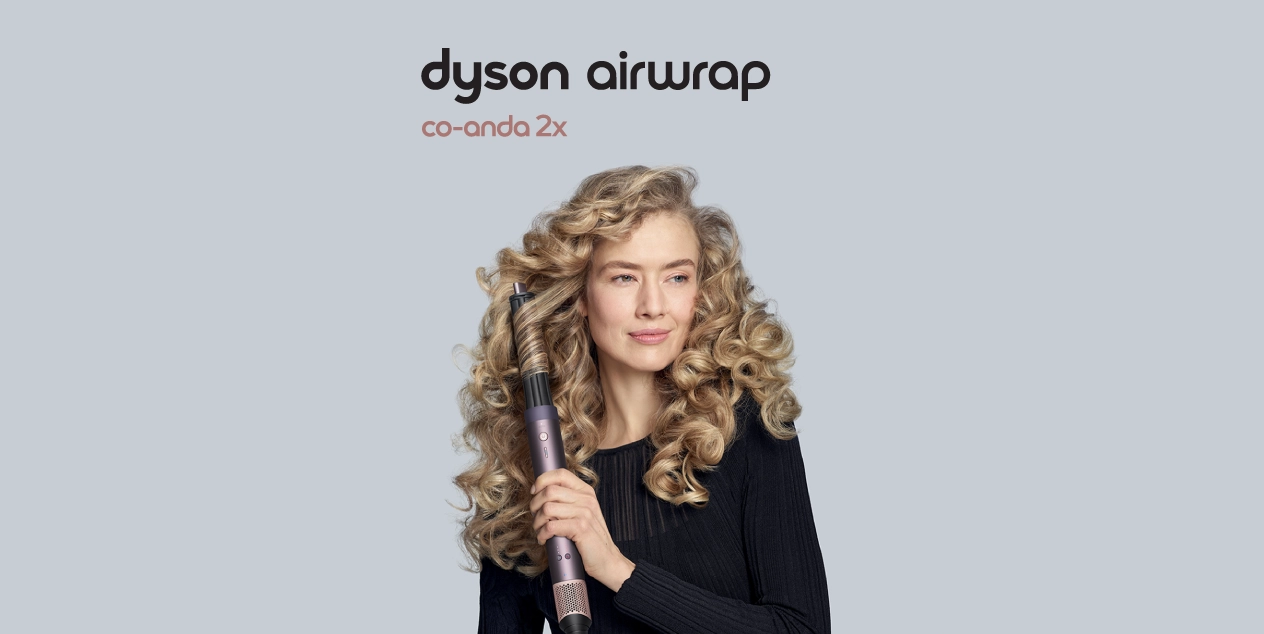 Sieviete ar cirtainiem matiem lieto Dyson